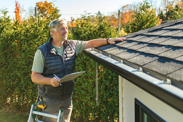 Professional Roofing technician working in Russell, MA